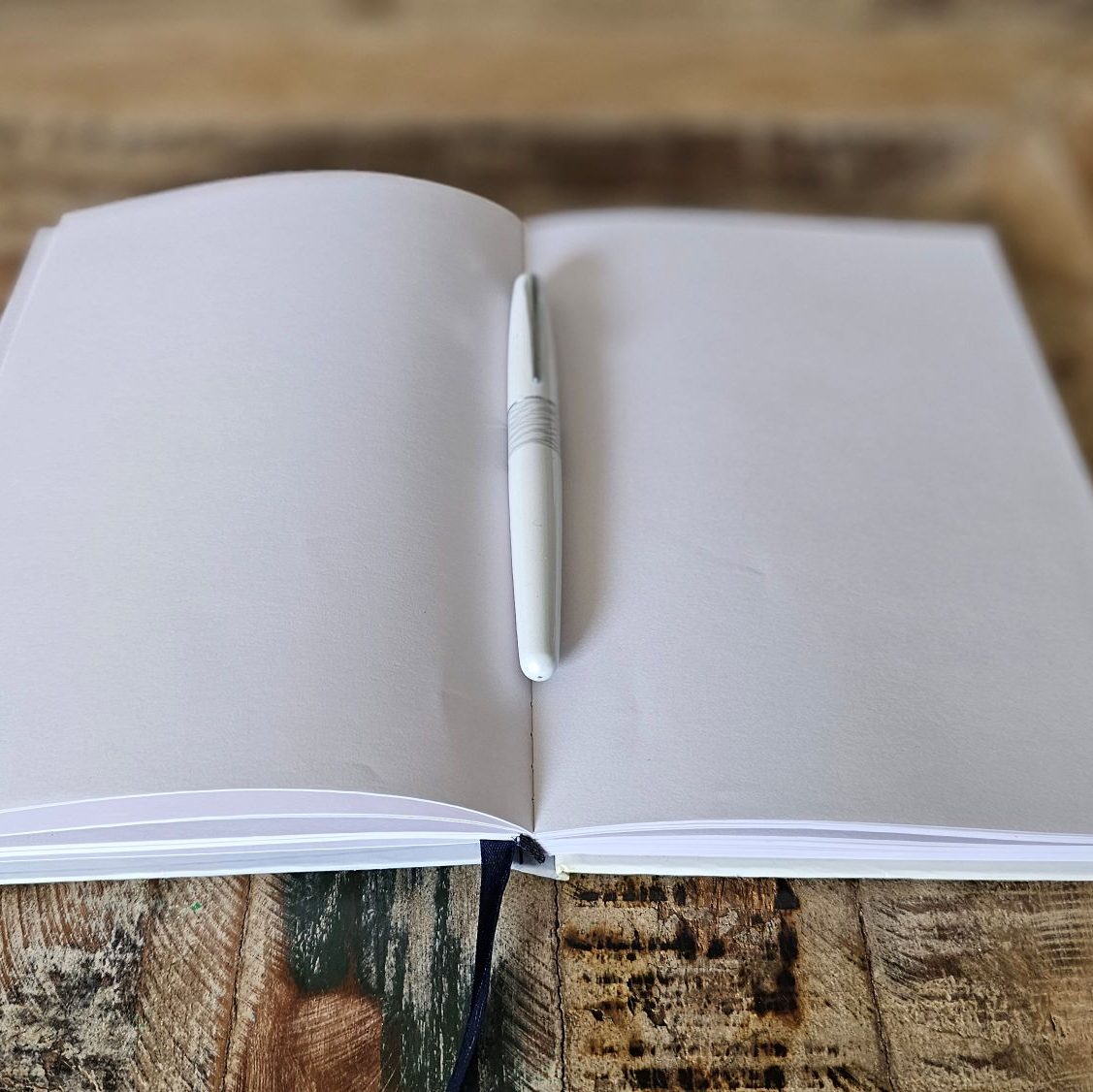 Notizbuch mit Stift